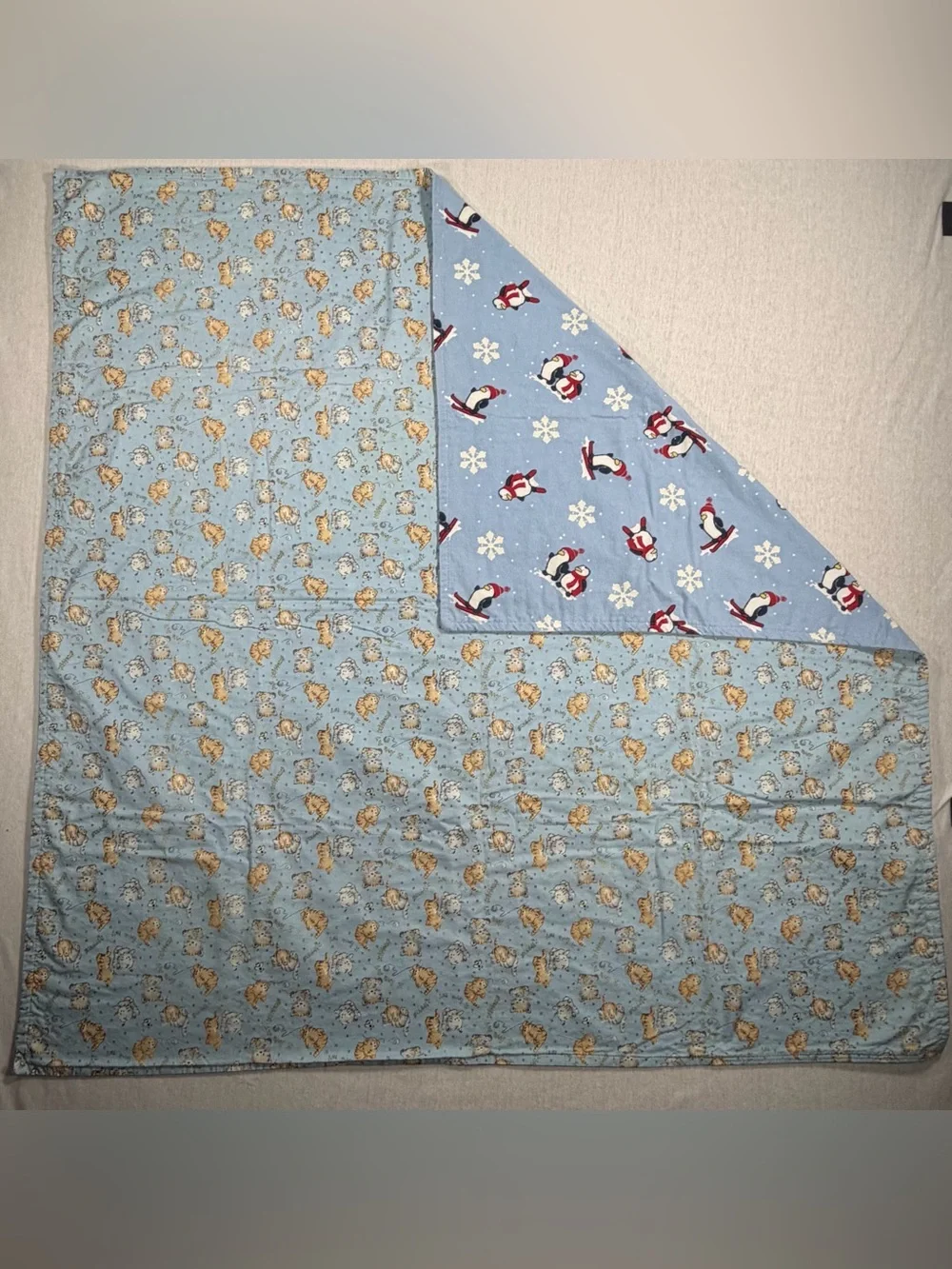Light Blue Reversible Penguin & Animal Print Quilt Throw